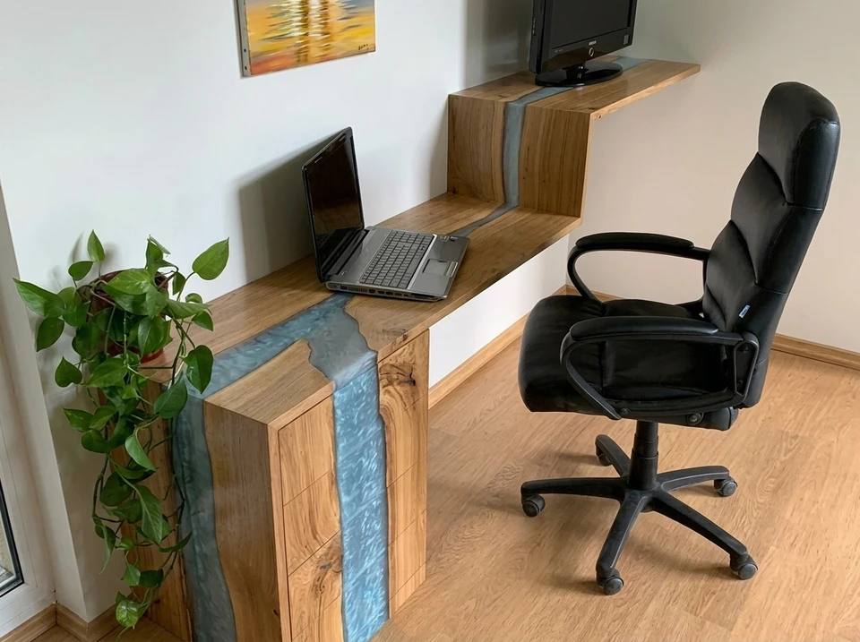 Cuisine moderne avec îlot central en bois massif, plan de travail intégrant plaque de cuisson gaz